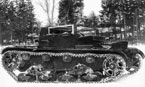 Артиллерийский танк АТ-1 на полигоне во время испытаний. Броневые щитки рубки откинуты.Зима 1935 года.