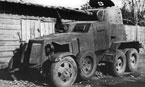 Бронеавтомобиль БА-10 "Орловские партизаны" на улице одной из освобождённых деревень. Этот броневик использовался в одном из партизанских отрядов Орловской области в 1941-1943 годах. Центральный фронт, август 1943 года.