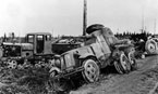 Уничтоженная советская колонна - на переднем плане БА-10, за ним трактор СТЗ-3 и грузовик ГАЗ-АА с 76-мм пушкой обр.1927 г. Июнь 1941 года.