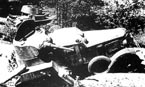 Уничтоженные в ходе боя бронеавтомобиль БА-10М и лёгкий танк Т-26. Юго-западный фронт, июнь 1941 года.