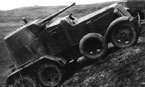 <Бронеавтомобиль БА-10 преодолевает подъём во время учений. Лето 1938 года.