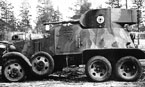 Финский бронеавтомобиль БА-6 с башней от танка БТ-7 (видны сварная маска пушки и заглушка револьверного отверстия). Хорошо виден камуфляж и бело-голубая кокарда на башне. 1945 год.
