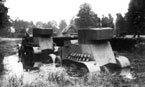 При попытке вытащить завязший броневик другим БА-6, застряли оба. ЛБТКУКС им.Бубнова. Лето 1936 года.