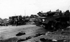 Уничтоженные ГАЗ-АА и бронемашина SdKfz 251/1 Ausf C
