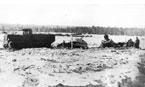 Эвакуация разбитых танков Т-26 тягачем «Коминтерн». Карельский перешеек, февраль 1940 года.
