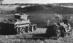 Танк БТ-7 и арттягач "Комсомолец" готовятся к атаке. Район реки Халхин-Гол. 1939 г.