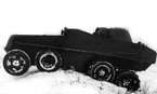 Бронеавтомобиль ПБ-7 во время ходовых испытаний в окрестностях Ижорского завода. Ноябрь 1937 года. На задние мосты одеты вездеходные цепи «Оверолл». Хорошо видна работа запасных колес при преодолении препятствий.
