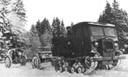 Трактор СТЗ-5 буксирует на огневую позицию 122-мм гаубицу М-30 обр.1938 г. Битва за Москву, 1941 г.