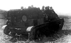 Отделение автоматчиков гв.старшего сержанта Д. Волкова на СУ-76М под прикрытием дымовой завесы атакует "противника". Приморский военный округ, Порт-Артур, 14 апреля 1948 года.