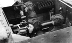 Экипаж старшины М.И.Бахметьева ведёт огонь по цели. Уральск, сентябрь 1952 года. Сам старшина награждён двумя нагрудными знаками: «отличный танкист» и «Отличный артиллерист».