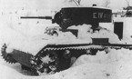 Танк Т-26, использовавшийся Вермахтом. На зелёной (4БО) башне белой краской нанесена неизвестная идентификационная система. Битва под Москвой. Январь, 1942 г.