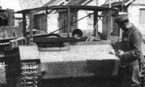 Т-26Т захваченный немцами. Тент снят, видна рама и вырез в корпусе в районе места механика-водителя.