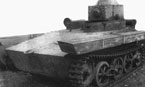 Легкий плавающий танк Т-33 на базе хранения опытных образцов на НИБТПолигоне в Кубинке. 1930-е годы. Большая часть элементов ходовой части по правому борту отсутствует