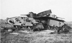 Т-35 из 67 танкового полка 8 мехкорпуса, уничтоженный авиационной бомбой или внутренним взрывом. Лето 1941 года, Восточная Украина.