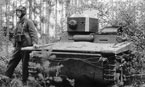 Т-37А на манёврах Белорусского военного округа. Сентябрь 1935 года. На башне белая полоса для отличия "своих" машин от танков условного противника, на буксирных крюках закреплён трос.