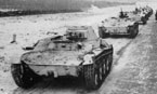 Танки Т-60 1-й гвардейской танковой бригады на марше. Западный фронт, ноябрь 1941года.