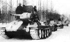Колонна танков Т-34 и Т-60 на марше. Западный фронт, ноябрь 1941  года.