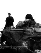 Немецкие танкисты готовят к бою трофейный советский танк Т-70М. Зима 1943 года.