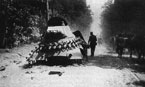 Бронеавтомобиль БА-11, подбитый и сгоревший на одной из дорог Украины. Юго-Западный фронт, июль 1941 года.