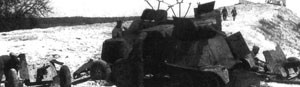 Бронеавтомобили БА-3 и 45-мм пушки, захваченные немцами у переправы через Березину. Июль 1941 года.
