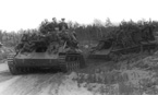 1238-й самоходно-артиллерийский под командованием подполковника И.Д. Котова. Погрузив на свои СУ-76М побольше пехотинцев, самоходчики движутся к следующей линии обороны финской армии. Ленинградский фронт, Карельский перешеек, июнь 1944 года.