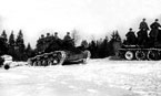 Танки Т-70М и Т-34 с десантом пехоты готовятся к атаке. Зима 1943 года.